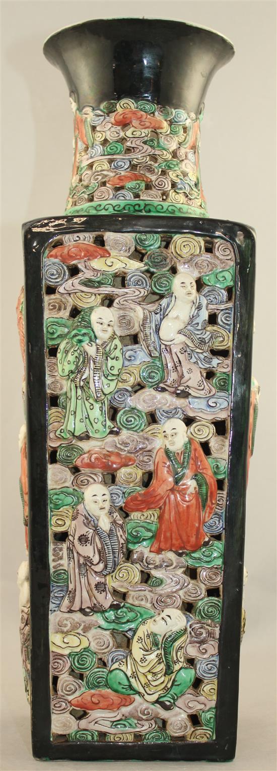 A Chinese double walled famille verte glaze biscuit porcelain vase, Qianlong mark, early 20th century, 44cm., damage to neck